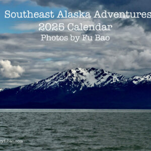 Calendar cover with image of snowy mountains.